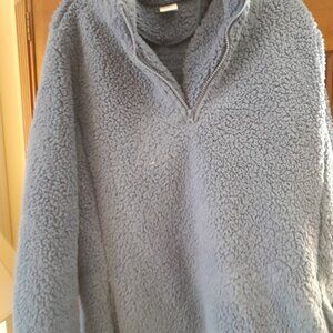 blue fluffy jacket with pockets